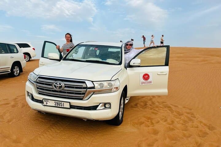 Dubai Desert Safari: 4x4 Dune Bashing, Camel Ride & BBQ Evening Experience photo 2