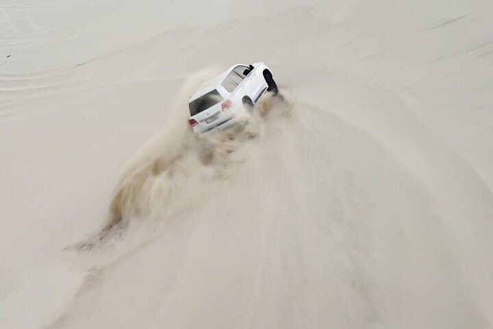 Doha Night Desert Safari: Private Dune Bashing & Camel Ride Experience
