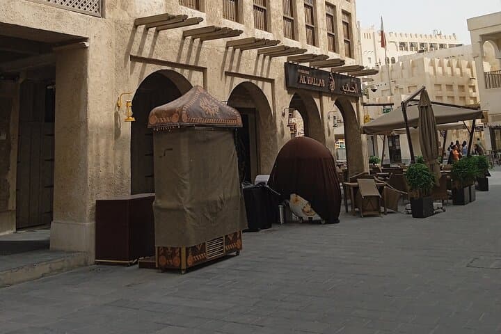 Doha Private Shopping Tour: Souq Waqif, Villaggio & City Centre Guide photo 4