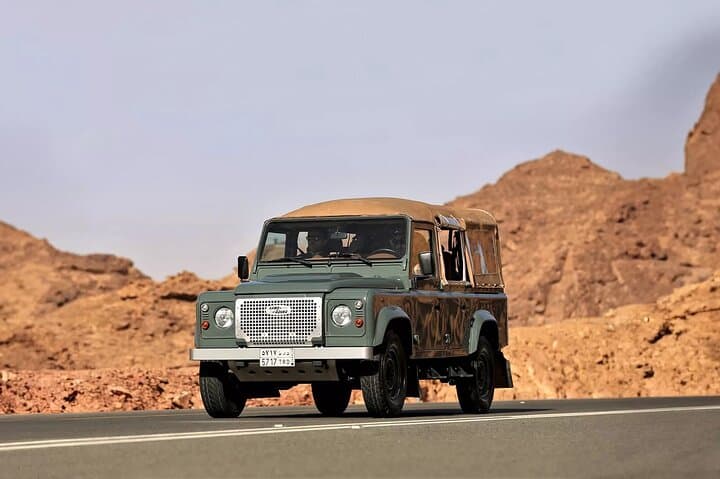 Explore Dadan and Jabal Ikmah: Private Vintage Land Rover Tour in AlUla photo 1