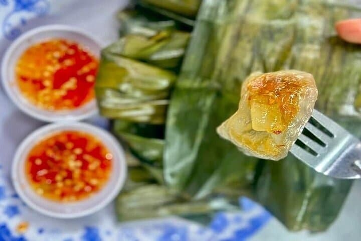 Da Nang Night Foodie Tour with Ao Dai Lady Riders — Motorbike Street Food & City Sights photo 3