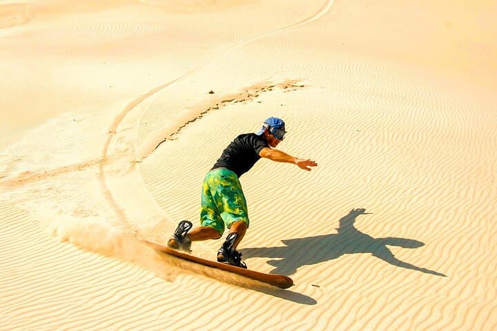Red Dune Morning Safari: Dune Bashing, Sandboarding & Camel Ride photo 4