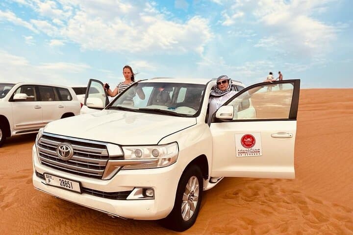 Red Dune Safari Dubai: Dune Bashing, Camel Rides & 5-Star Desert BBQ
