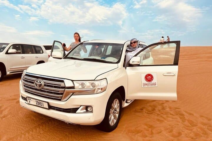 Sunset Luxury Desert Safari Dubai: Dune-Bashing, Camel Rides & Live Shows photo 2