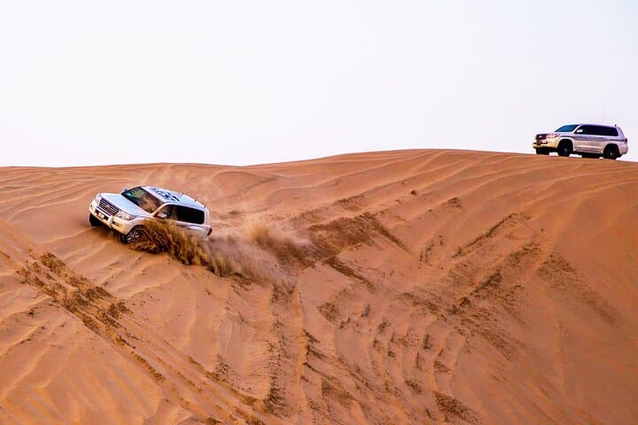 Private Mesaieed Sandboarding & Inland Sea Desert Safari from Doha