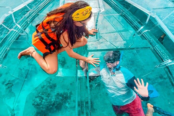 clear-bottom-boat-isla-mujeres-transparent-boat-tour-coral-reefs photo 3