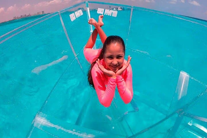 clear-bottom-boat-isla-mujeres-transparent-boat-tour-coral-reefs photo 4