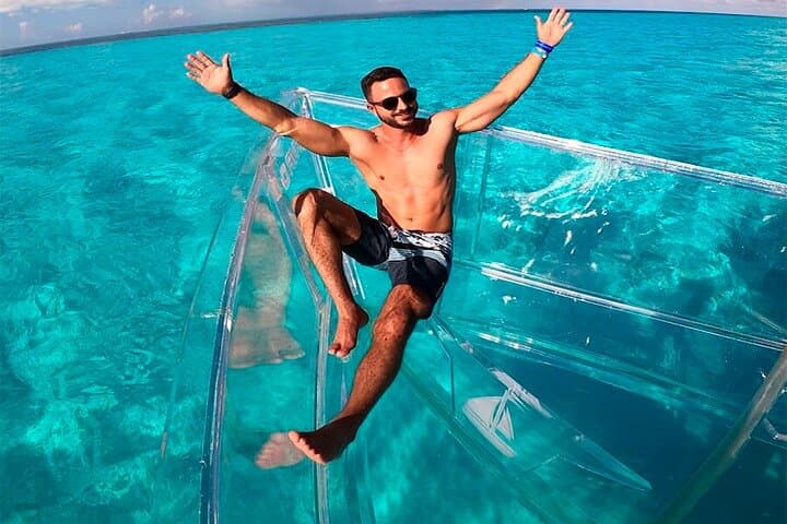 clear-bottom-boat-isla-mujeres-transparent-boat-tour-coral-reefs photo 2