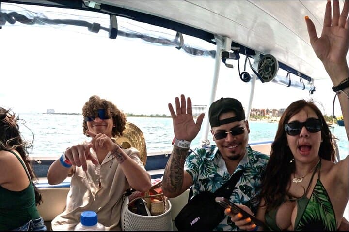 Sunset Catamaran Cruise to Isla Mujeres from Cancun: Beach Time, Town Tour & Drinks photo 2