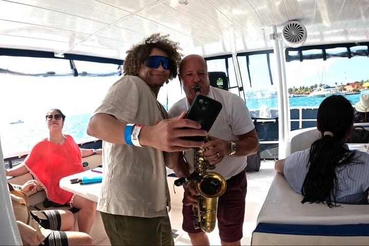 Sunset Catamaran Cruise to Isla Mujeres from Cancun: Beach Time, Town Tour & Drinks photo 4