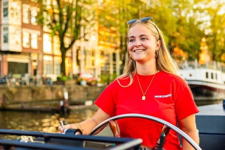Amsterdam Open-Boat Canal Cruise: Guided Tour with Unlimited Drinks photo 6