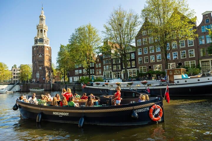 Amsterdam Open-Boat Canal Cruise: Guided Tour with Unlimited Drinks photo 3