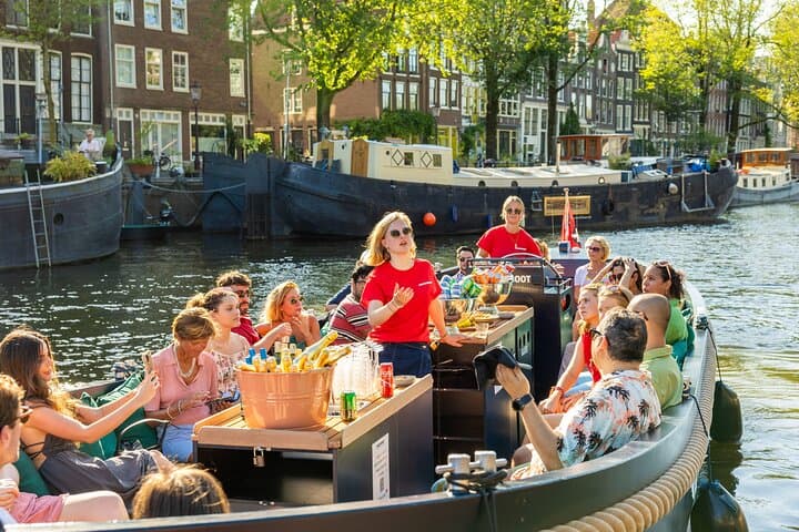 Amsterdam Open-Boat Canal Cruise: Guided Tour with Unlimited Drinks photo 2