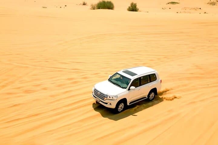 Morning Desert Safari in Dubai – Quad Biking, Camel Ride & Dune Bashing