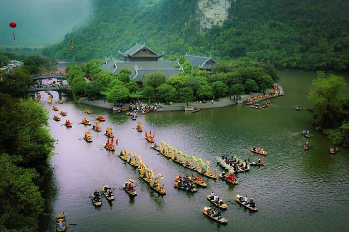 Full-Day Ninh Binh: Tam Coc Boat, Hoa Lu Temples & Village Cycling from Hanoi photo 2