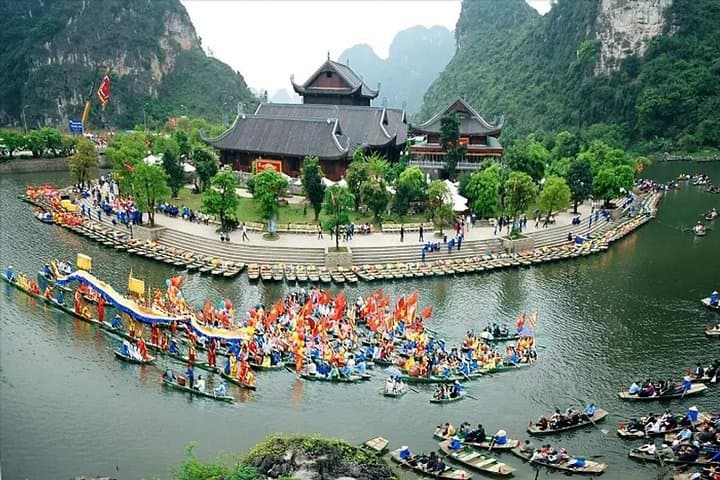 Full-Day Ninh Binh: Tam Coc Boat, Hoa Lu Temples & Village Cycling from Hanoi photo 3
