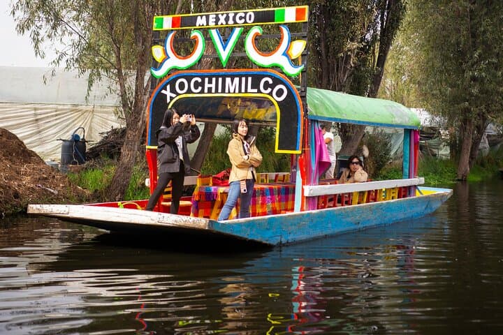 Xochimilco Canals Sunrise Kayak & Trajinera Tour with Cuicuilco Pyramid Visit photo 3