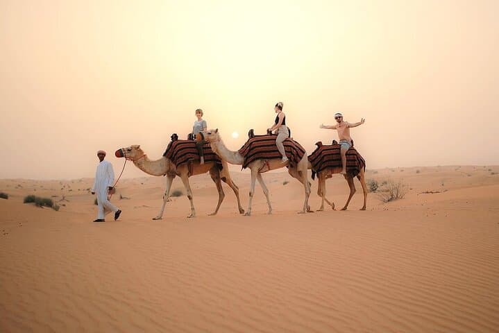 Red Dune Dubai Desert Safari: Sandboarding, Camel Rides & Night Camp Experience photo 4