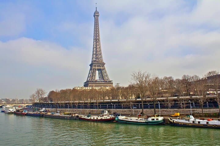 Eiffel Tower Walking Tour & Seine Boat: Best Photo Spots, History, and Practical Tips photo 3