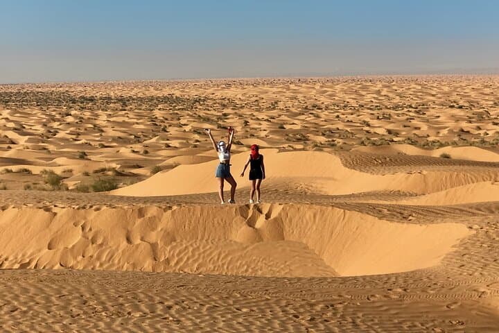 Ksar Ghilane Day Trip: Oasis Hot Spring, Dunes, Camel & Quad from Djerba