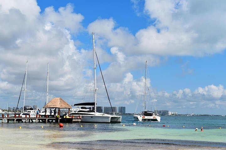 Catamaran to Isla Mujeres: Snorkel El Meco, Beach Club Lunch & Open Bar photo 2