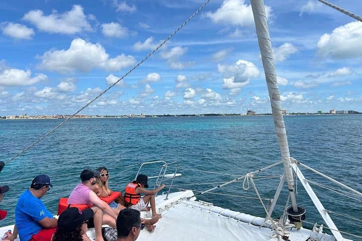 Catamaran to Isla Mujeres: Snorkel El Meco, Beach Club Lunch & Open Bar photo 4