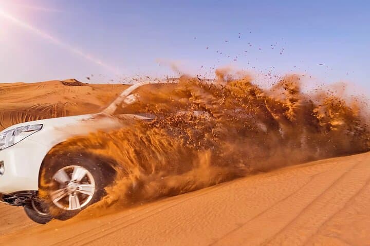Dubai Red Dunes ATV Safari: Buggy Rides, Camel Trails & 5-Star Desert BBQ