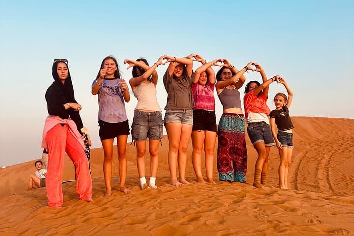 Evening Red Dunes Safari in Dubai — Sunset Dune Bashing, Sandboarding & BBQ Camp photo 3