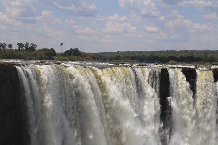 Victoria Falls from Both Sides: Guided Day Tour & Sunset Zambezi Cruise