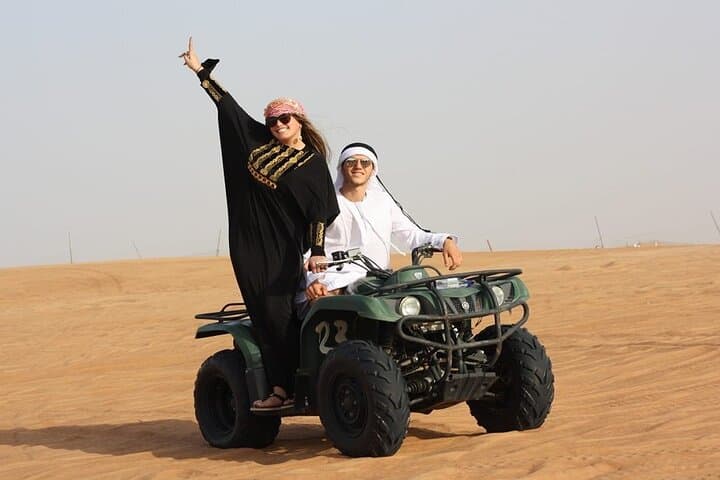 Dubai Desert Quad Bike Safari: Dune Bashing, Camel Rides & BBQ Under the Stars photo 2