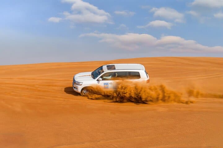 VIP Red Dune Desert Safari with Camel Ride & BBQ in Dubai photo 2