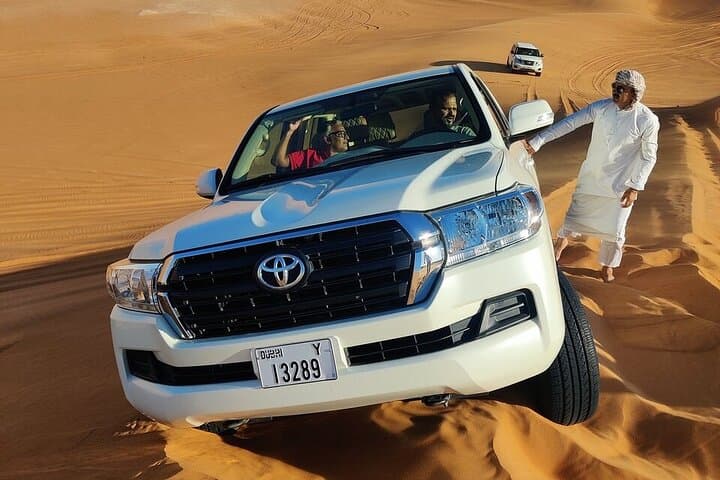 Red Dunes Desert Safari Dubai: Dune Bashing, Camel Ride & BBQ Under Stars photo 2