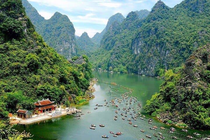 Hoa Lu & Tam Coc Luxury Day Trip from Hanoi — Boat, Temples & Cycling photo 2