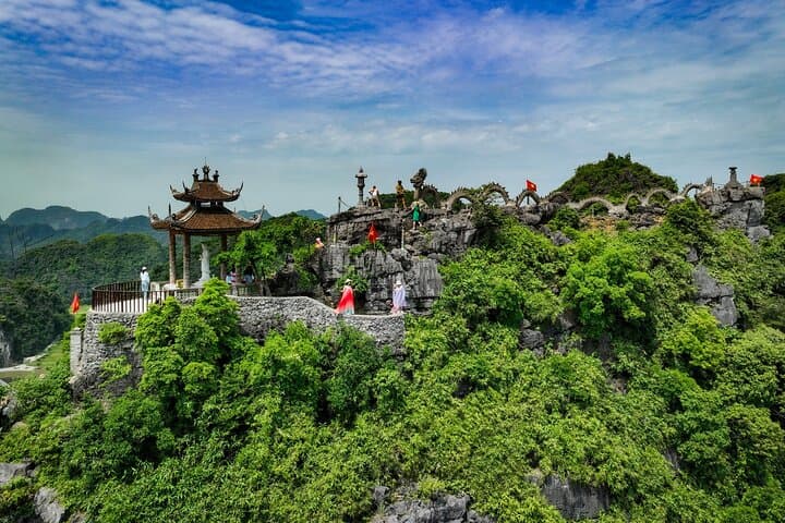 Full-Day Hoa Lu, Tam Coc & Mua Caves Tour from Hanoi — Boat, Bike & Mountain Views photo 2