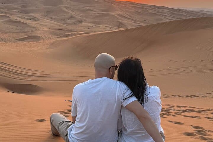 Red Dunes Sunset Desert Safari with Quad Bike & Camel Ride in Dubai photo 3