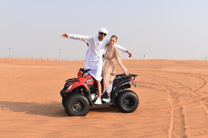 Dubai Red Dunes Safari: Quad Bike, Camel Ride & BBQ Experience photo 3