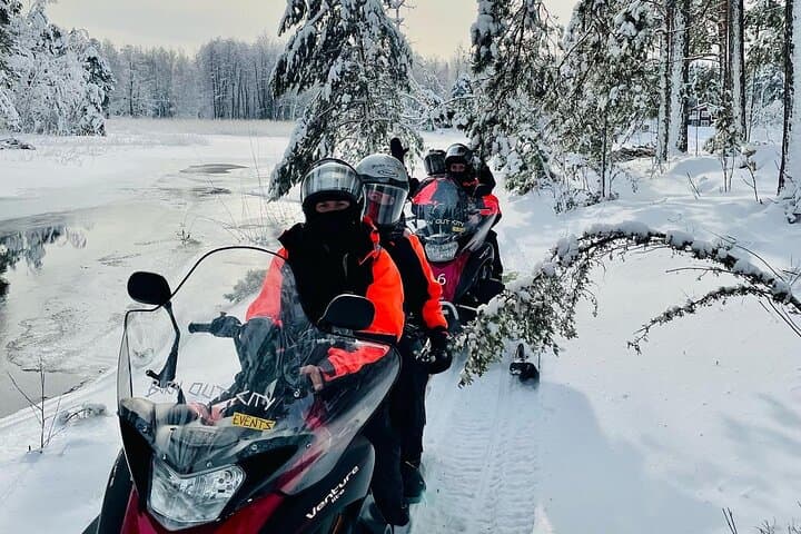 Snowmobile Tour and Glass Igloo Experience near Helsinki