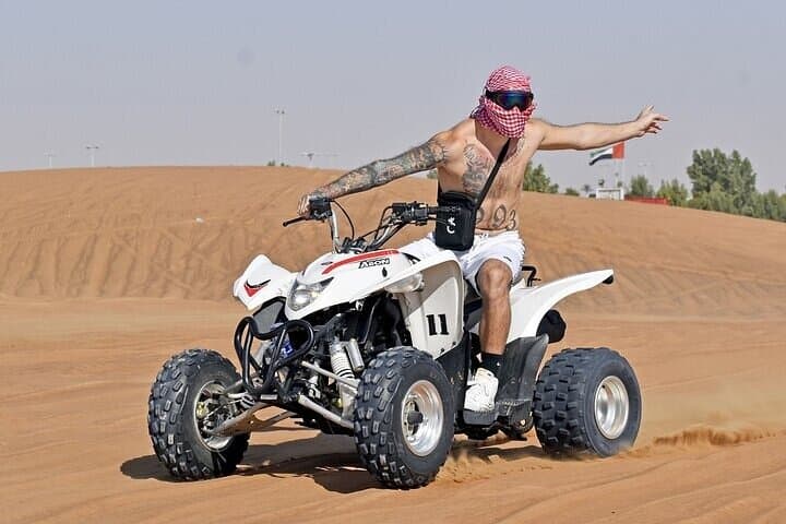 Raptor 700cc Dubai Desert Quad Bike Adventure — Conquer the Big Dunes photo 4