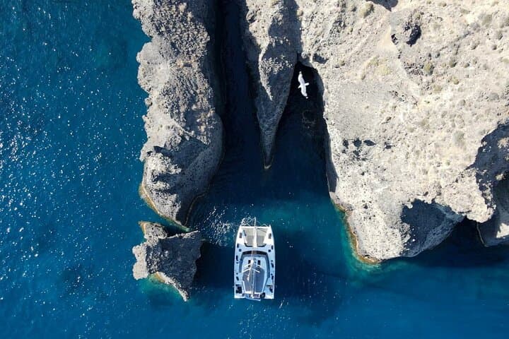 Santorini Platinum Half-Day Catamaran: Red Beach, Hot Springs & Cliffside Views