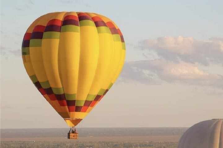 Golden Skies of Mendoza: Sunset Hot Air Balloon Over Vineyards photo 4