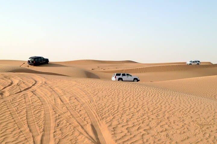 Sunset Dubai Desert Safari: Private 4x4 Dune Bashing, Camel Ride & BBQ Camp photo 6