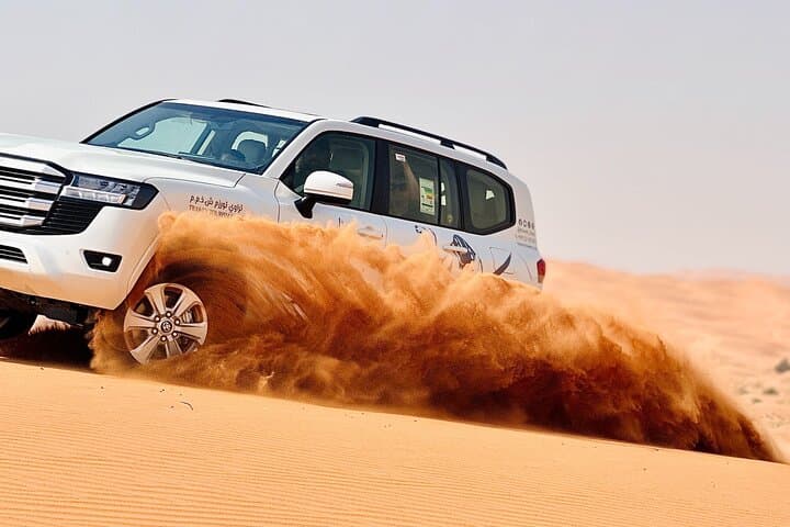 Dubai Sunrise Desert Safari: Dune Bashing, Sandboarding & Camel Ride photo 5