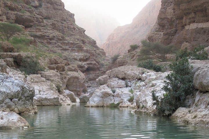 Wadi Shab and Bimmah Sinkhole Day Trip from Muscat — Swim Caves & Turquoise Pools photo 4