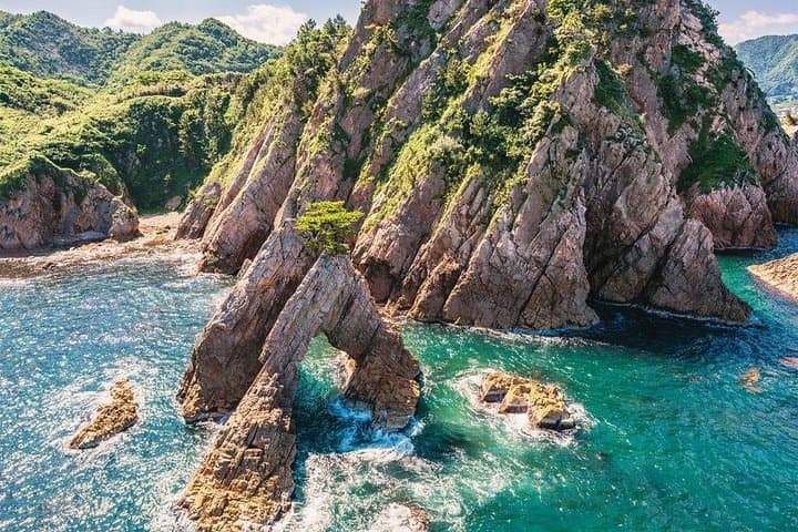5-Day One-Way Bus Trip Osaka to Fukuoka via San'in: Coastal Castles, Onsen & Caves photo 1