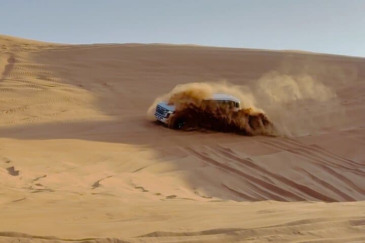 Dubai Unique Sunset Combo: 4WD and Quad Bike Red Dunes Safari photo 5