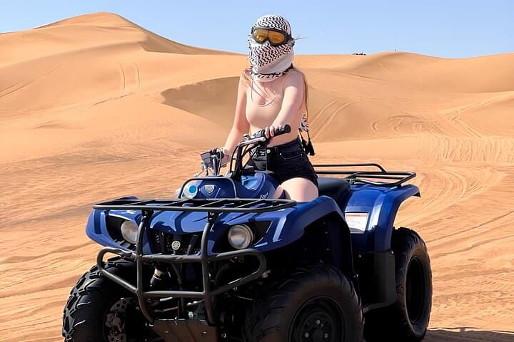 Dubai Unique Sunset Combo: 4WD and Quad Bike Red Dunes Safari photo 6