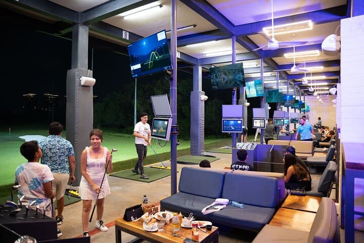 Sunset-to-Night Toptracer Golf in Cancún: Driving-Bay Fun After Dark photo 2