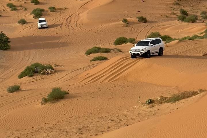 Private Dubai Morning Desert Safari — Jeep Dune Bashing, Camel Ride & Sandboarding photo 1