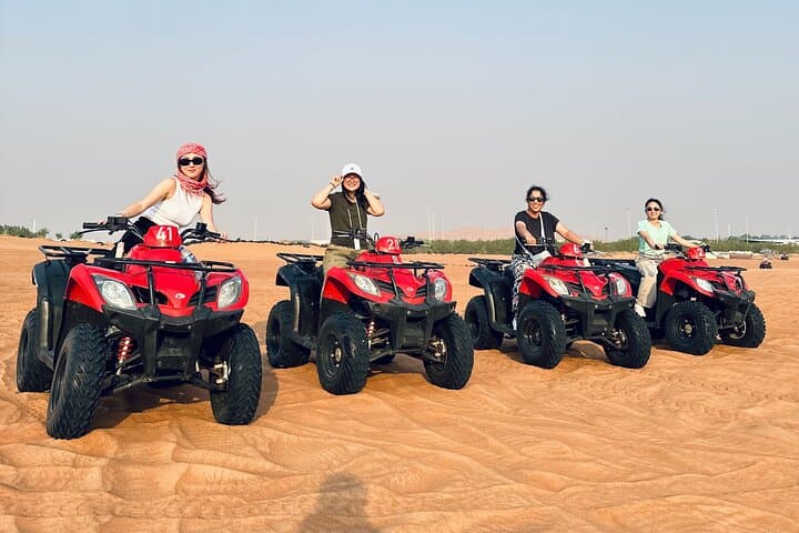 Red Dunes Quad Bike & Evening Desert Safari with BBQ and Live Shows in Dubai photo 4