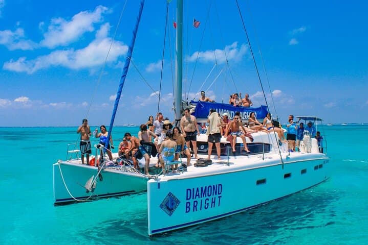 Luxury Catamaran to Isla Mujeres from Cancun — Snorkel, Beach Club & Sunset Spinnaker